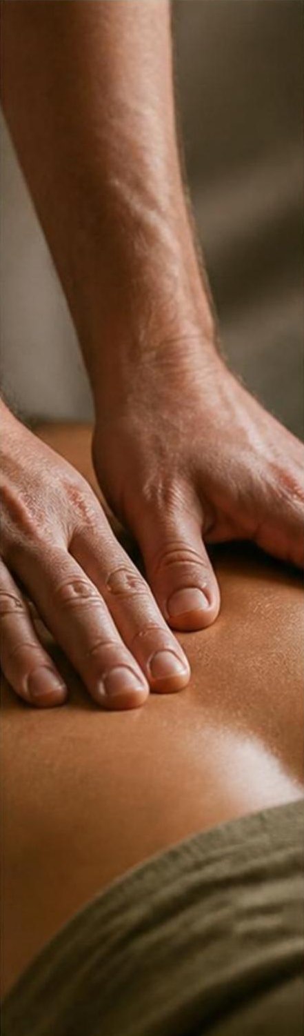 Hands performing a back massage